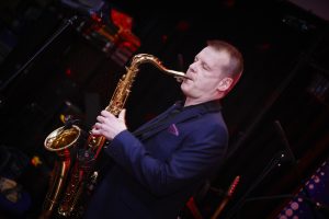 man playing saxophone