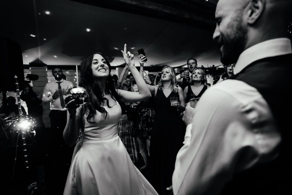 a bride and groom dancing at their wedding