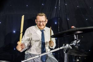 man drumming for a wedding band