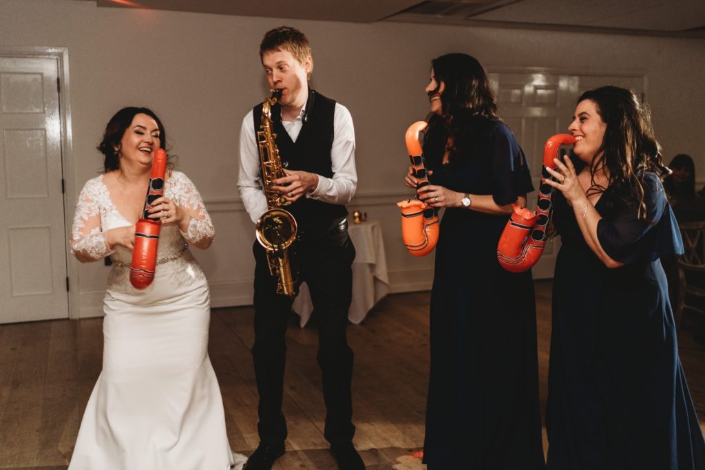 bride playing saxophone