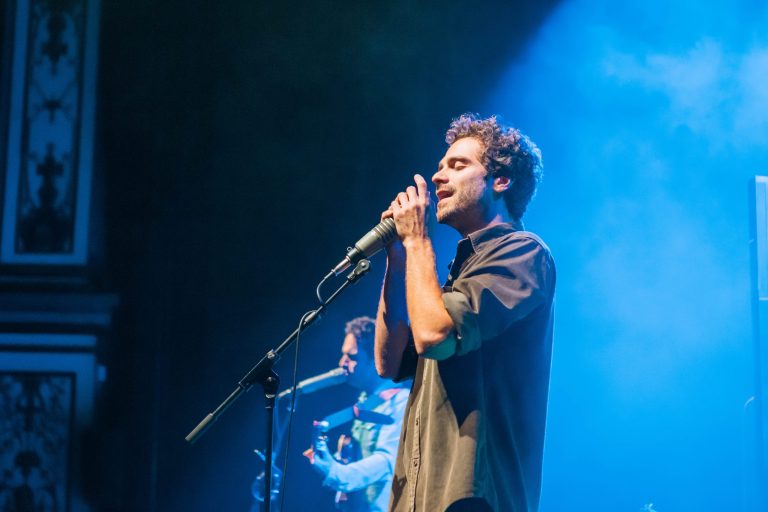 vocalist singing on stage