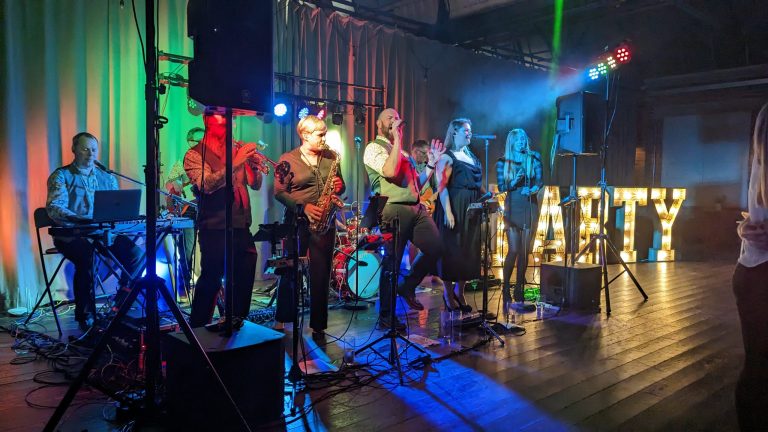 9 piece band playing live at a party
